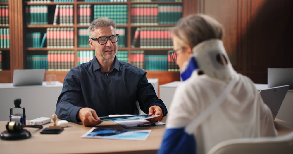 Lawyer assisting an injured man with a legal problem. How does an accident attorney work?